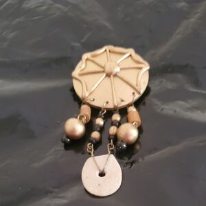 *Pin on brooch